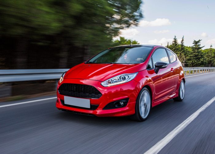 20230507055523_[fpdl.in]_red-mini-coupe-driving-highway_114579-4059